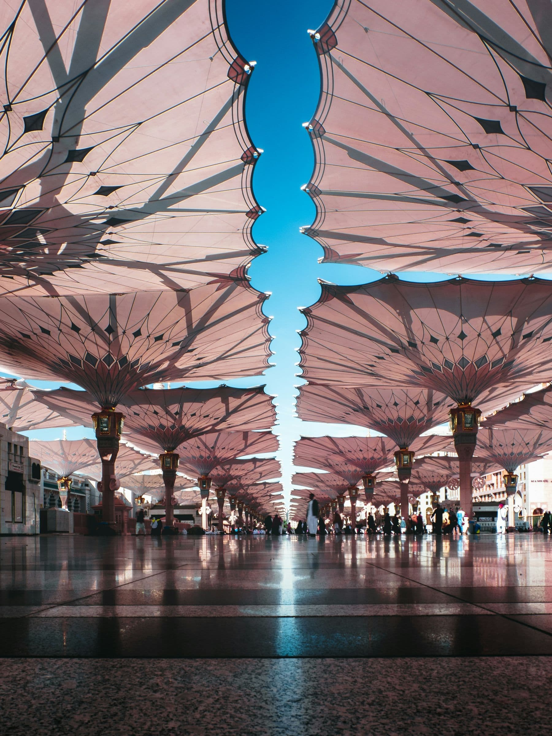 Looking up through the courtyard umbrellas of the Prophet's Mosque