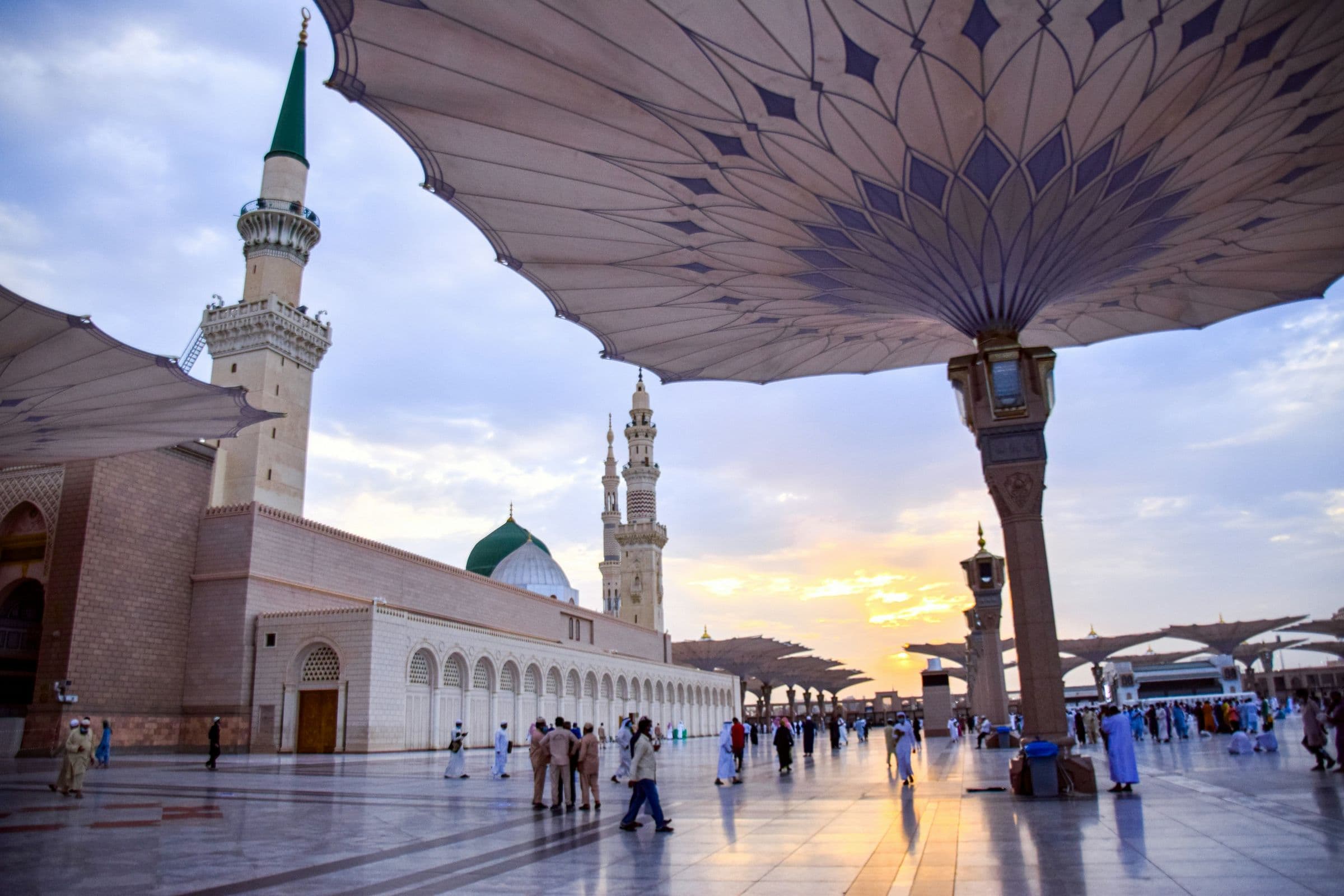 The courtyard umbrellas of the Prophet's Mosque at sunset